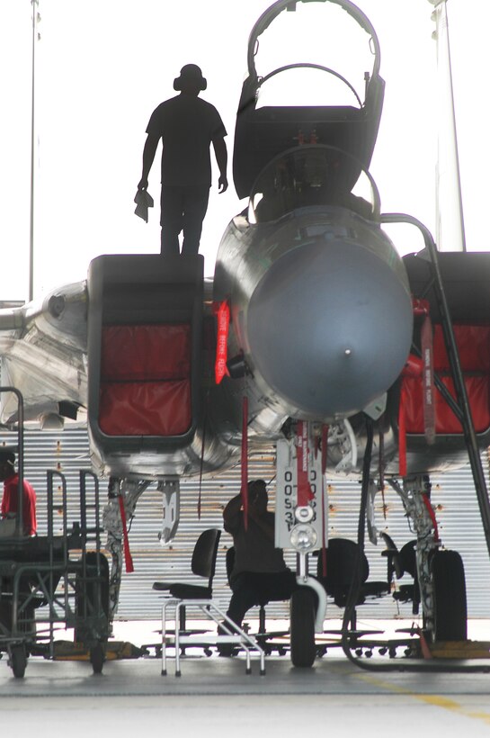 Mechanics work in concert with test flight pilots to certify aircraft as worthy to return to the fight. (U. S. Air Force photo/Sue Sapp)