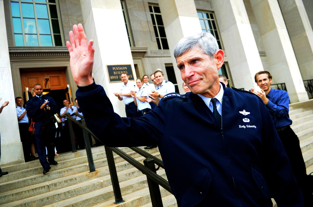 Gen. Norton Schwartz bids farewell to his Airmen while departing from the Pentagon Aug. 8, 2012, for the final time as the Air Force Chief of Staff. Schwartz will retire in a ceremony Friday, after serving 39 years in the Air Force, the last four years as the Air Force's senior uniformed leader. (U.S.Air Force photo by Master Sgt. Cecilio Ricardo)

