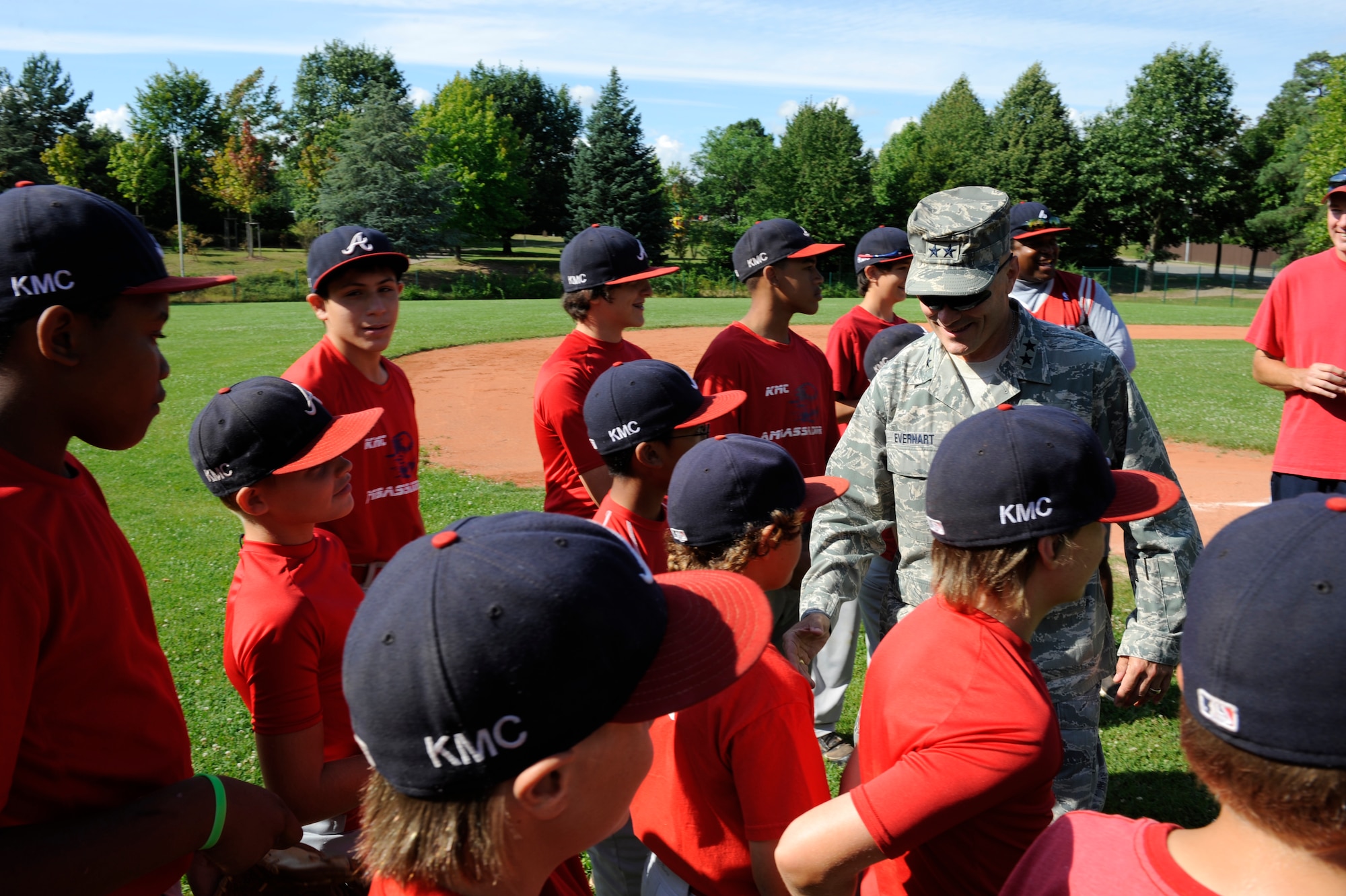 Maj. Gen. Carlton D. Everhart II, 3rd Air Force vice commander, greets athletes from the KMC all stars before practice at Donnelly Park on Ramstein Air Base, Aug. 7, 2011. For the third time in four years, the KMC all stars advanced to the Little League World Series beginning Aug. 16 in Williamsport, Penn. (U.S. Air force photo/ Senior Airman Aaron-Forrest Wainwright)