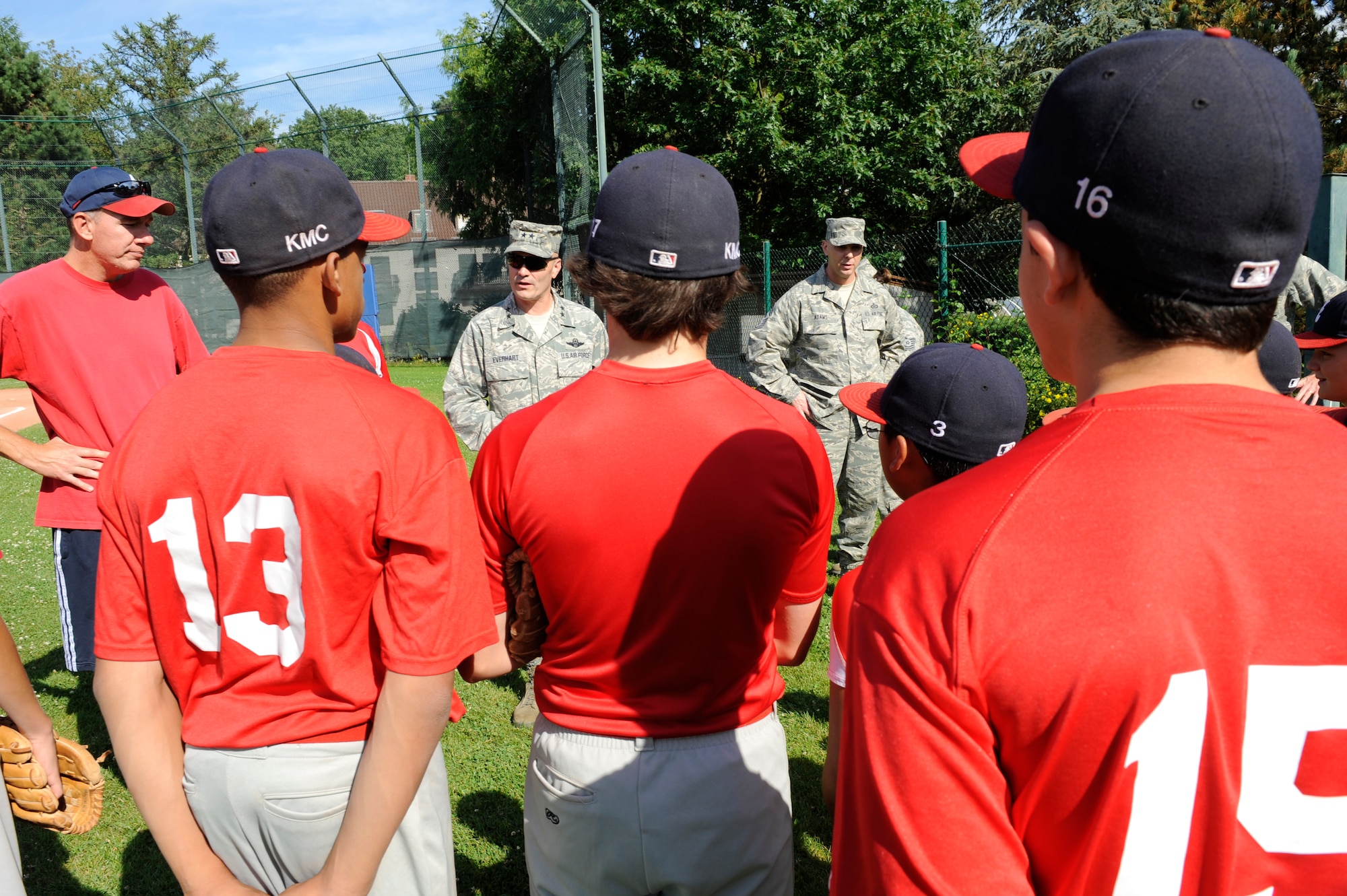 Maj. Gen. Carlton D. Everhart II, 3rd Air Force vice commander, greets athletes from the KMC all stars before practice at Donnelly Park on Ramstein Air Base, Aug. 7, 2011. For the third time in four years, the KMC all stars advanced to the Little League World Series beginning Aug. 16 in Williamsport, Penn. (U.S. Air force photo/ Senior Airman Aaron-Forrest Wainwright)