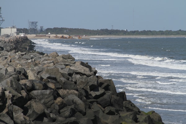 WALLOPS ISLAND, Va. -- Crews work to build a new beach at NASA Wallops Island Flight Facility here. The newly built beach will help protect more than $1 billion in federal government and Commonwealth of Virginia assets located here.  The Wallops Island facility is home to, not only NASA, but also the US Navy Surface Combat Systems Center and the Mid-Atlantic Regional Spaceport making this a growing economic generator for the Commonwealth of Virginia and the region. 