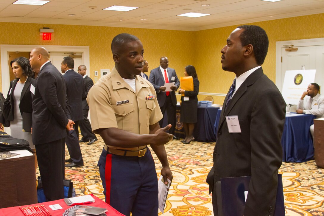 Capt. Adesina Aladetohun, officer selection officer, Recruiting Station Baton Rouge, speaks to a law student at the 2012 National Black Prosecutors Association job fair at the Roosevelt Hotel, July 31. Marines attended the NBPA’s annual convention and job fair to establish relationships with community leaders and prospect for potential Marine officers among the law students in attendance.


