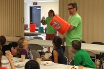 Volunteers from First Baptist Church of Friendsville, Tenn., hold a Vacation Bible School for children of Marine Corps Air Station New River, N.C., Marines at the air station chapel, July 18. 