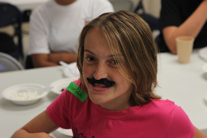 Volunteers from First Baptist Church of Friendsville, Tenn., hold a Vacation Bible School for children of Marine Corps Air Station New River, N.C., Marines at the air station chapel, July 18. 