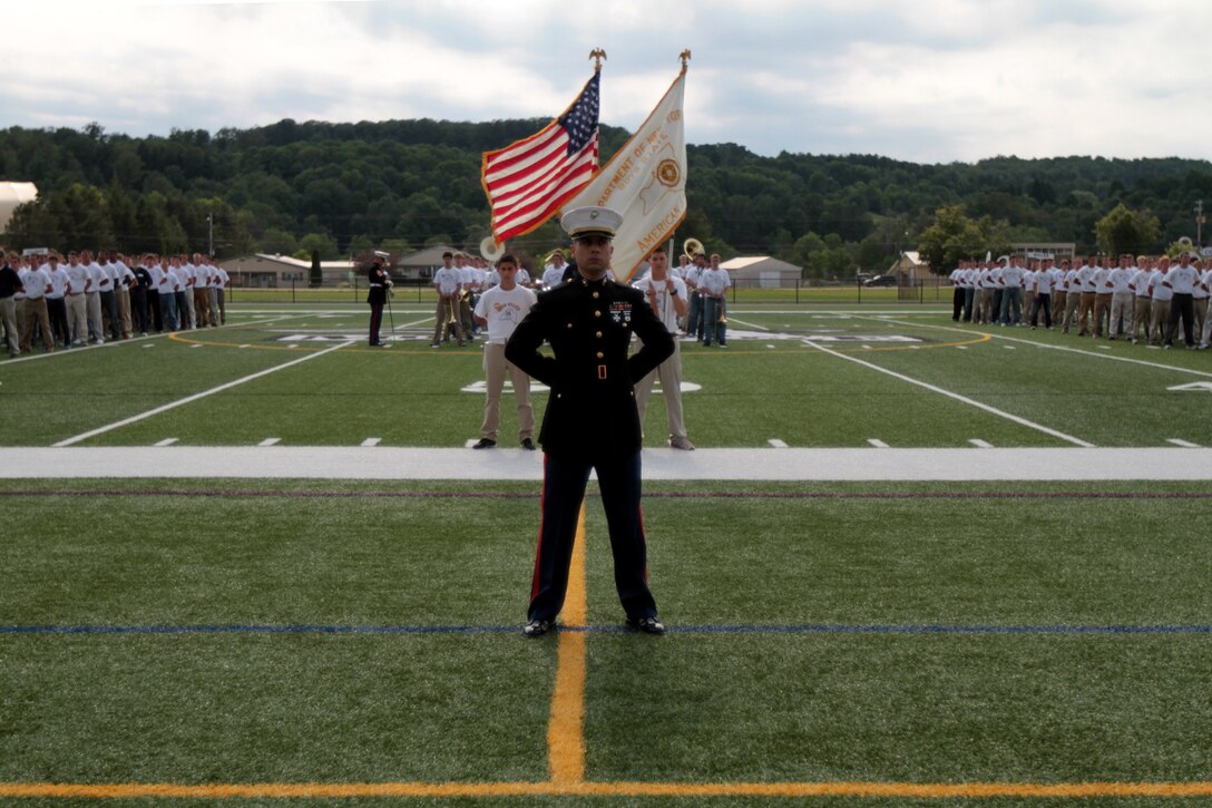 MORRISVILLE, N.Y., (June 28, 2012) – Captain Jordan P. Then, recruiting support officer, Recruiting Station Buffalo, N.Y., commands the parade during the 75th annual New York American Legion Boys State in Morrisville, N.Y., June 28, 2012.The New York American Legion hosts some 1,100 incoming high school seniors from across New York State during the weeklong civics and leadership camp each year at the State University of New York, Morrisville. Boys State participants are assigned to simulated “counties” and “cities”, and form a state government throughout the week.Recruiting Station Albany, RS Buffalo, RS New York, and Headquarters First Marine Corps District, provide Marines to act as mentors and instructors during Boy’s State. The Marines typically teach basic drill and ceremony, customs and courtesies, and room maintenance. (Official Marine Corps Photo By Sgt. Timothy Parish)(RELEASED)     

