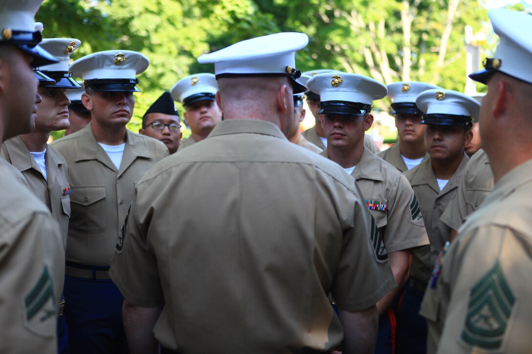 Staff Sgt. Wesley Carpenter, a motor transport operations chief with Combat Logistics Regiment 2, 2nd Marine Logistics Group, speaks with his Marines prior to marching in the parade for Maine’s 2012 Lobster Festival in Rockland, Aug. 4. Carpenter helped organize the Marines for the festival. (Photo by Lance Cpl. Paul Peterson)