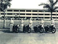Durward Swanson, third from the left, stands with his patrol team in front of the 3,200-man consolidated barracks early 1941 photo at Hickam Field. Swanson was a staff sergeant in the Army Air Corps when the Japanese executed their surprise attack of the military installations on the Hawaiian island of Oahu. Swanson went on to the Battle of Midway in June 1942 as a crew chief, where his B-17 was shot down, leaving him with injuries to his leg, side and face. (Courtesy photo) 