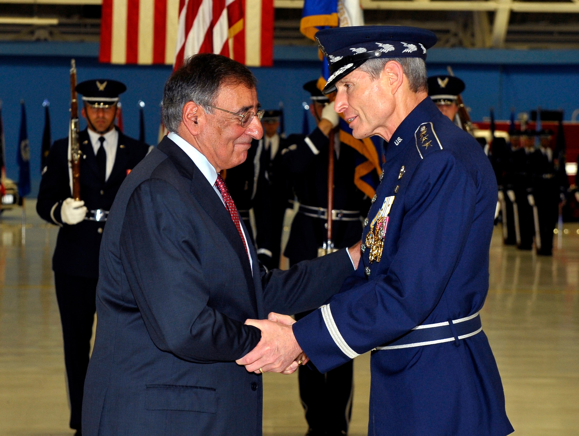 Secretary of Defense Leon Panetta congratulates Gen. Norton Schwartz on the occasion of his retirement during a ceremony at Joint Base Andrews, Md., Aug. 10, 2012.  Schwartz served as Air Force chief of staff for four years and was succeeded by Gen. Mark A. Welsh III.  Welsh previously commanded U.S. Air Forces in Europe.  (U.S. Air Force photo/Michael J. Pausic)