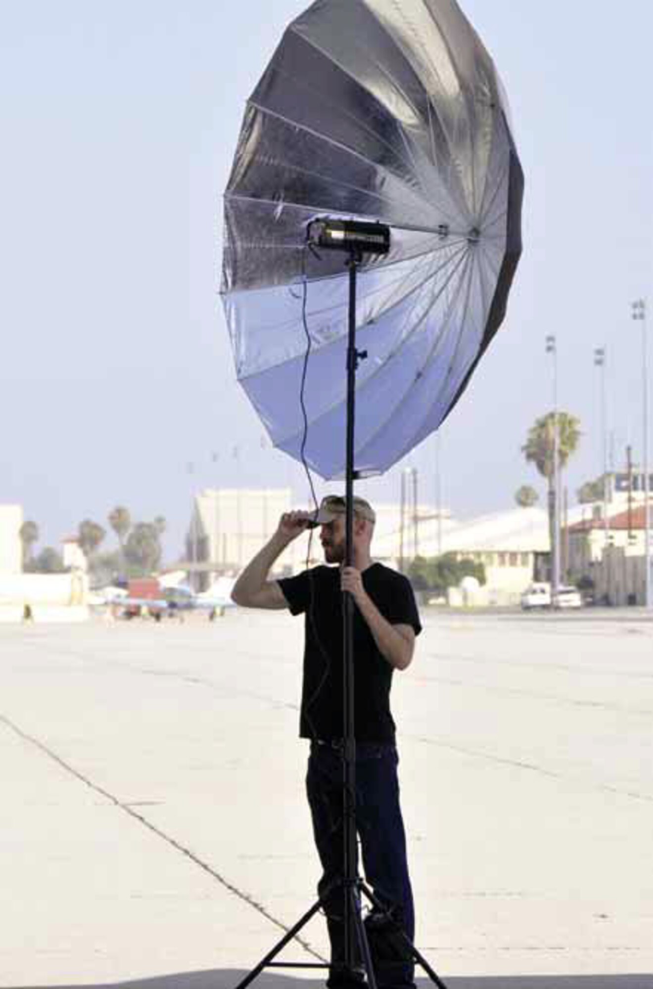 Photographers from Blaine Warren Advertising visited March Air Reserve Base, Calif., to take photos of a C-17, July 30. The agency is shooting a commercial for the Air Force Reserve and will be using the C-17 photos as a reference to model their new media van. (U.S. Air Force photos by Senior Airman Isis Ponce)
