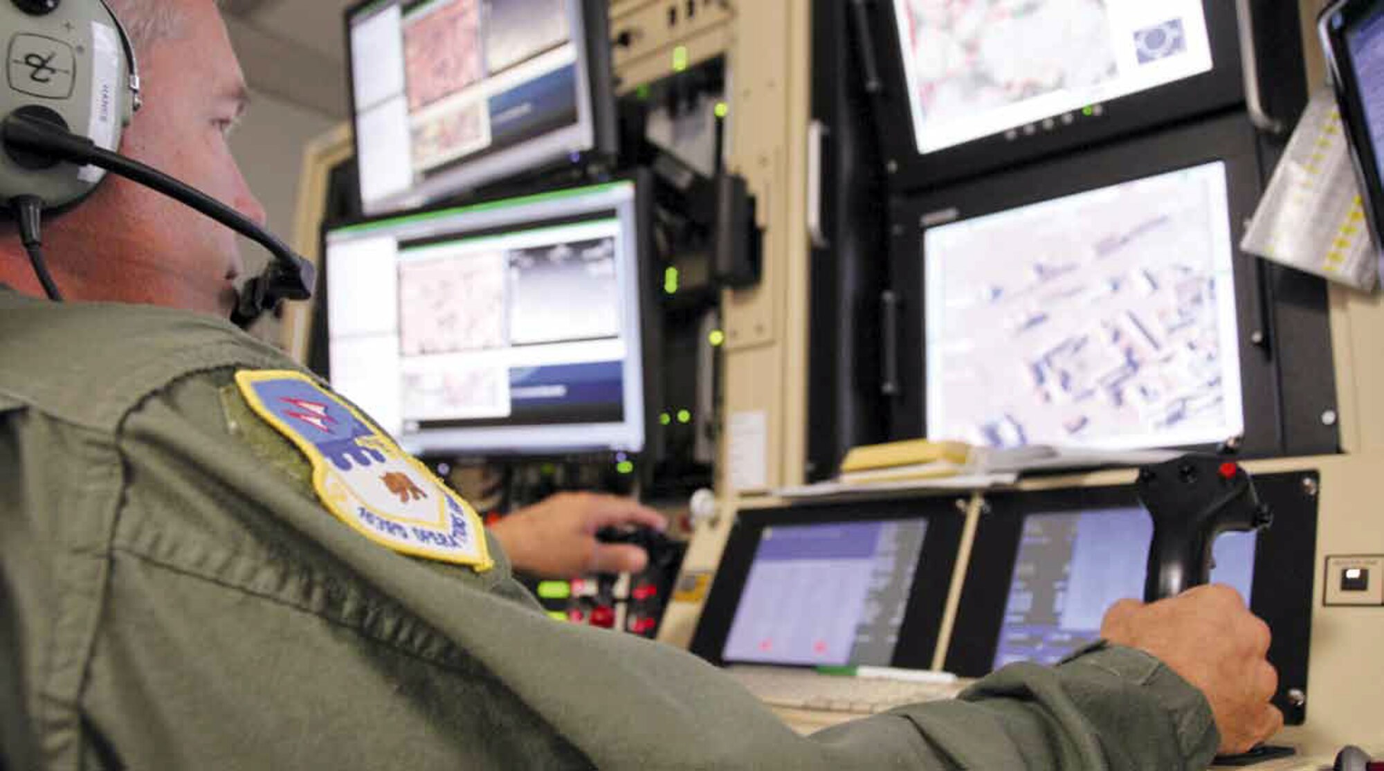 During Grizzly Field Exercise 2012, the 163rd Reconnaissance Wing engaged with its primary platform, the MQ-1 Predator, and was tasked with providing full motion video to the State Joint Operations Center, 234th Intelligence Squadron, Nongovernmental agencies, Northern Command, and the 601st Air Operations Center in support of a search and rescue mission for possible survivors. The exercise was a proof of concept for domestic operations in assisting with disaster response. The joint exercise marked a pivotal turning point for cross agency involvement with the Army National Guard, State Military Reserve, and civilian agencies. (U.S. Air Force photo by Tech. Sgt. Neil S. Ballecer)