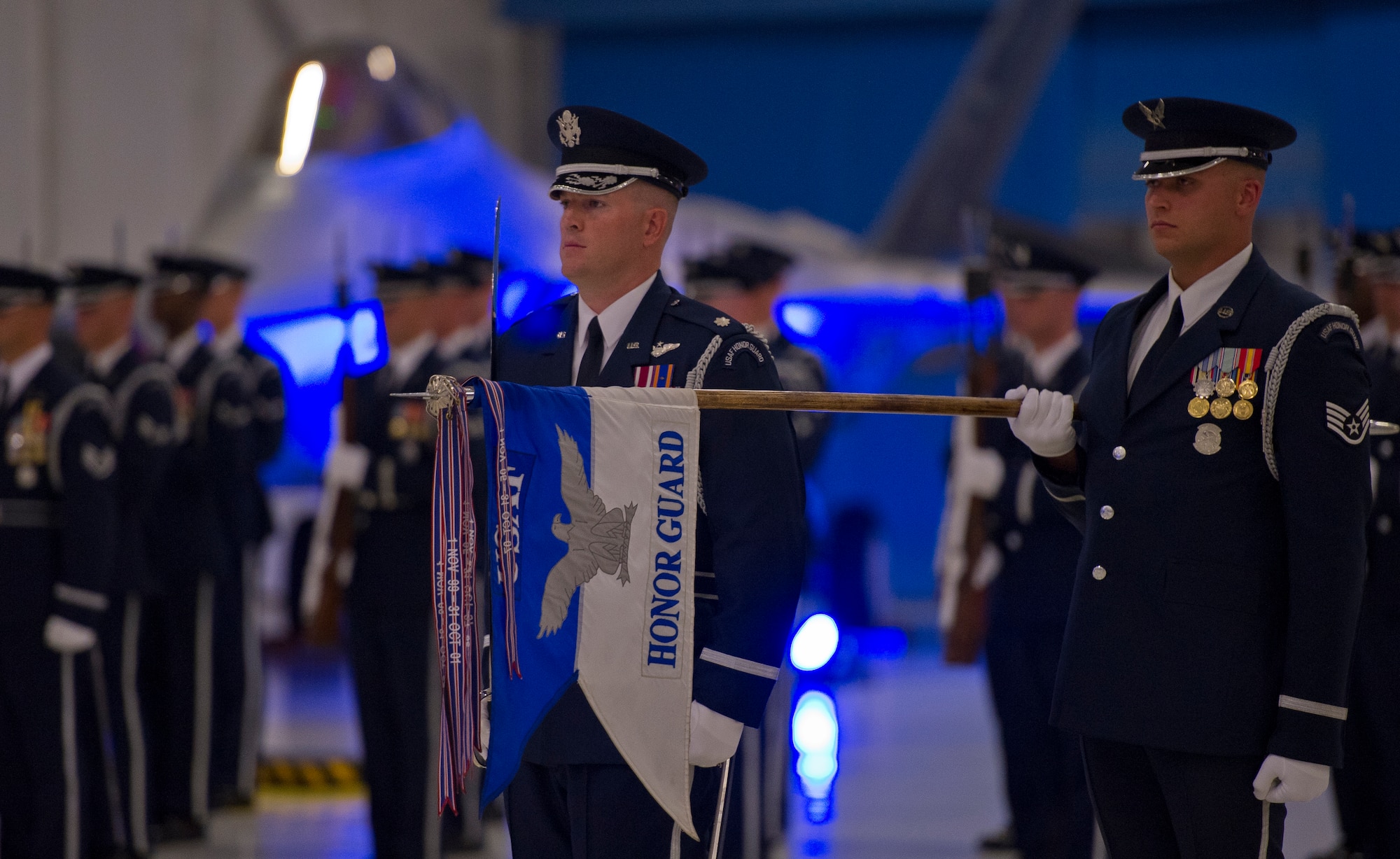 The U.S. Air Force Honor Guard and U.S. Air Force Band perform a pass and review on Aug. 10, 2012, at Joint Base Andrews, Md. for the Air Force Chief of Staff transition ceremony. During the ceremony, Gen. Norton Schwartz retired from active duty and passed on the duty of Air Force Chief of Staff to Gen. Mark A. Welsh III. (U.S. Air Force Photo/Senior Airman Perry Aston)