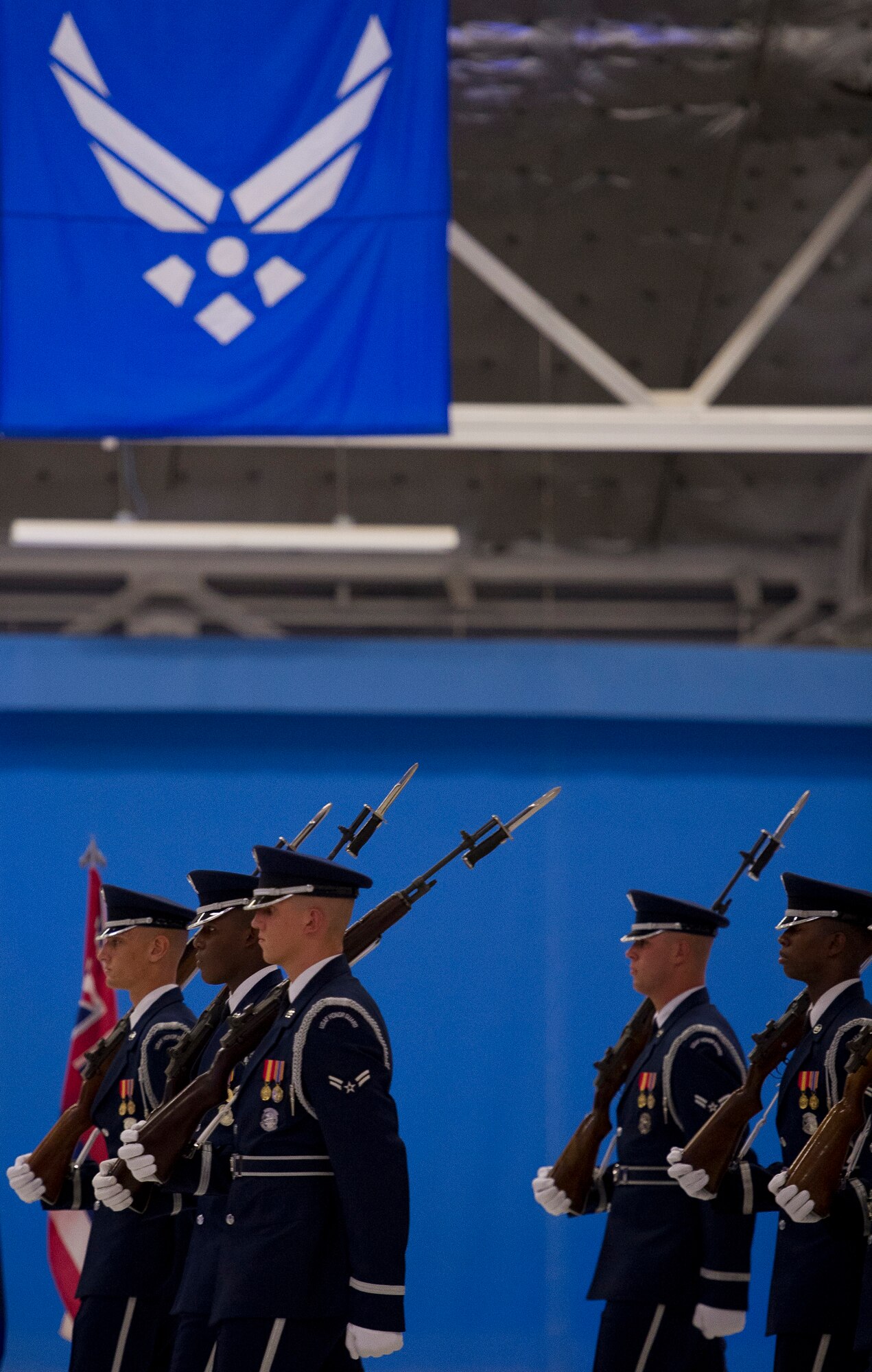 The U.S. Air Force Honor Guard and U.S. Air Force Band perform a pass and review on Aug. 10, 2012, at Joint Base Andrews, Md. for the Air Force Chief of Staff transition ceremony. During the ceremony, Gen. Norton Schwartz retired from active duty and passed on the duty of Air Force Chief of Staff to Gen. Mark A. Welsh III. (U.S. Air Force Photo/Senior Airman Perry Aston)