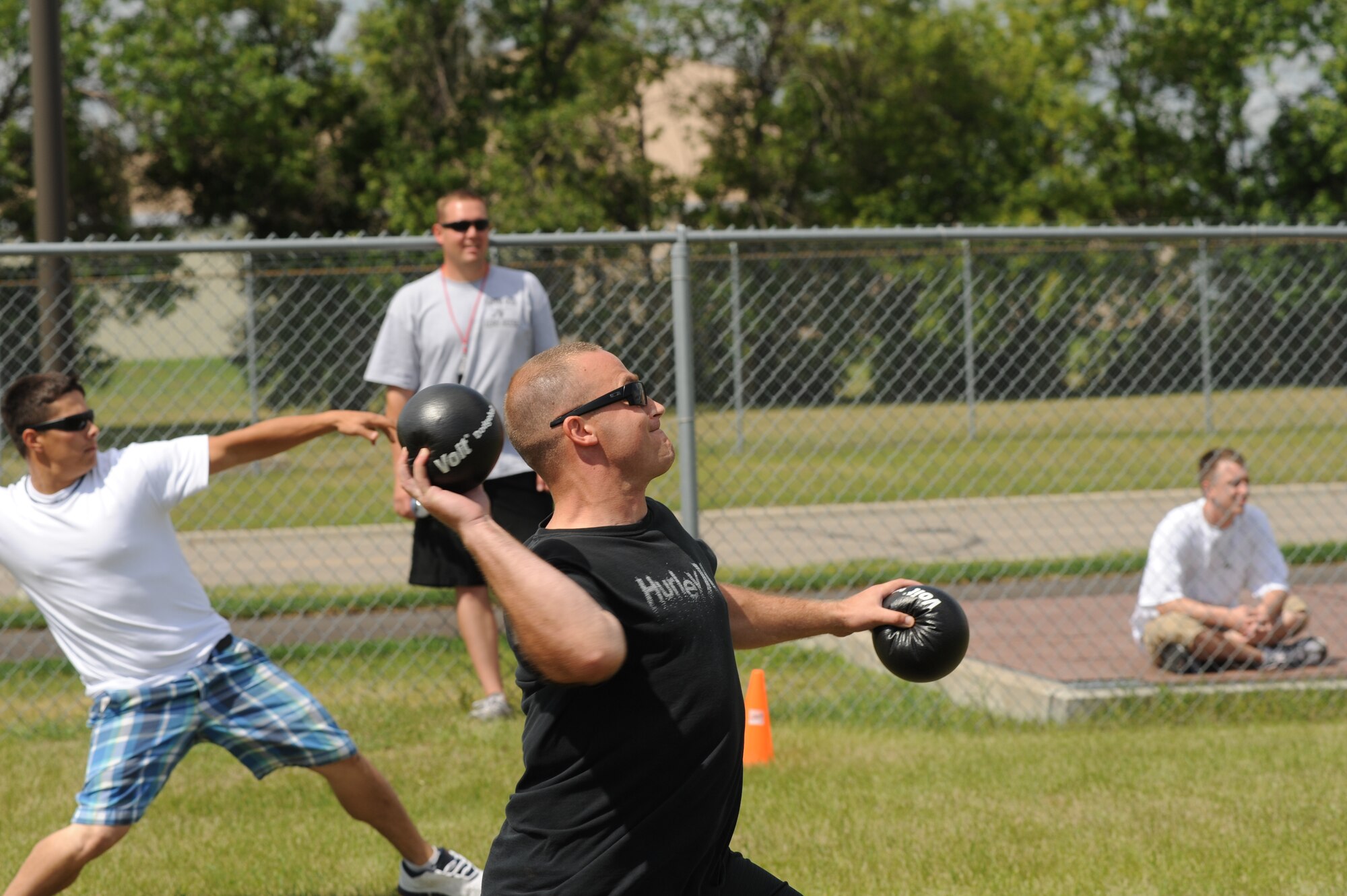 Staff Sgt. George Childress, 319th Logistics Readiness Squadron, throws a dodge ball Aug. 9 during Summer Bash 2012 on Grand Forks Air Force Base, N.D. Summer Bash is an annual event designed to boost morale and increase esprit de corps.  The 319th Operations Support Squadron placed first overall, with the 319th Civil Engineer Squadron placing second and the 69th Reconnaissance Group placing third. (U.S. Air Force/Staff Sgt. Amanda N. Grabiec)
