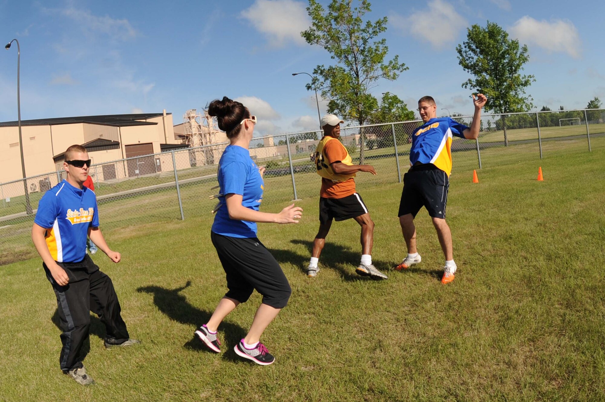 Members from the 69th Reconnaissance Group and the 319th Logistics Readiness Squadron compete in “Watch Your Back” Aug. 9 during Summer Bash 2012 on Grand Forks Air Force Base, N.D. Summer Bash is an annual event designed to boost morale and increase esprit de corps.  The 319th Operations Support Squadron placed first overall, with the 319th Civil Engineer Squadron placing second and the 69th Reconnaissance Group placing third. (U.S. Air Force/Staff Sgt. Amanda N. Grabiec)