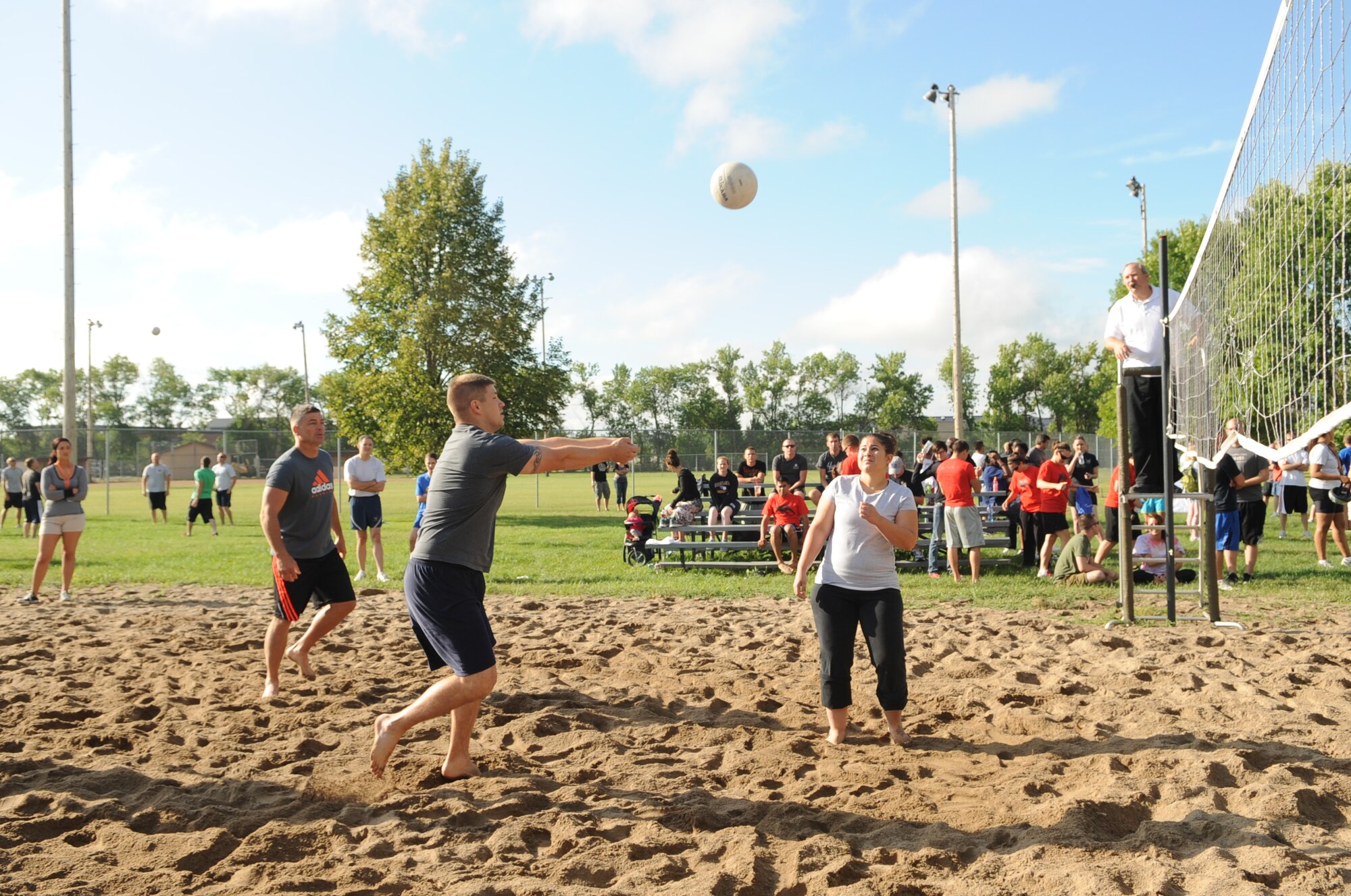 Master Sgt. Jason Gall, 319th Air Base Wing, returns a serve during a volleyball game Aug. 9 during Summer Bash 2012 on Grand Forks Air Force Base, N.D. Summer Bash is an annual event designed to boost morale and increase esprit de corps.  The 319th Operations Support Squadron placed first overall, with the 319th Civil Engineer Squadron placing second and the 69th Reconnaissance Group placing third. (U.S. Air Force/Staff Sgt. Amanda N. Grabiec)