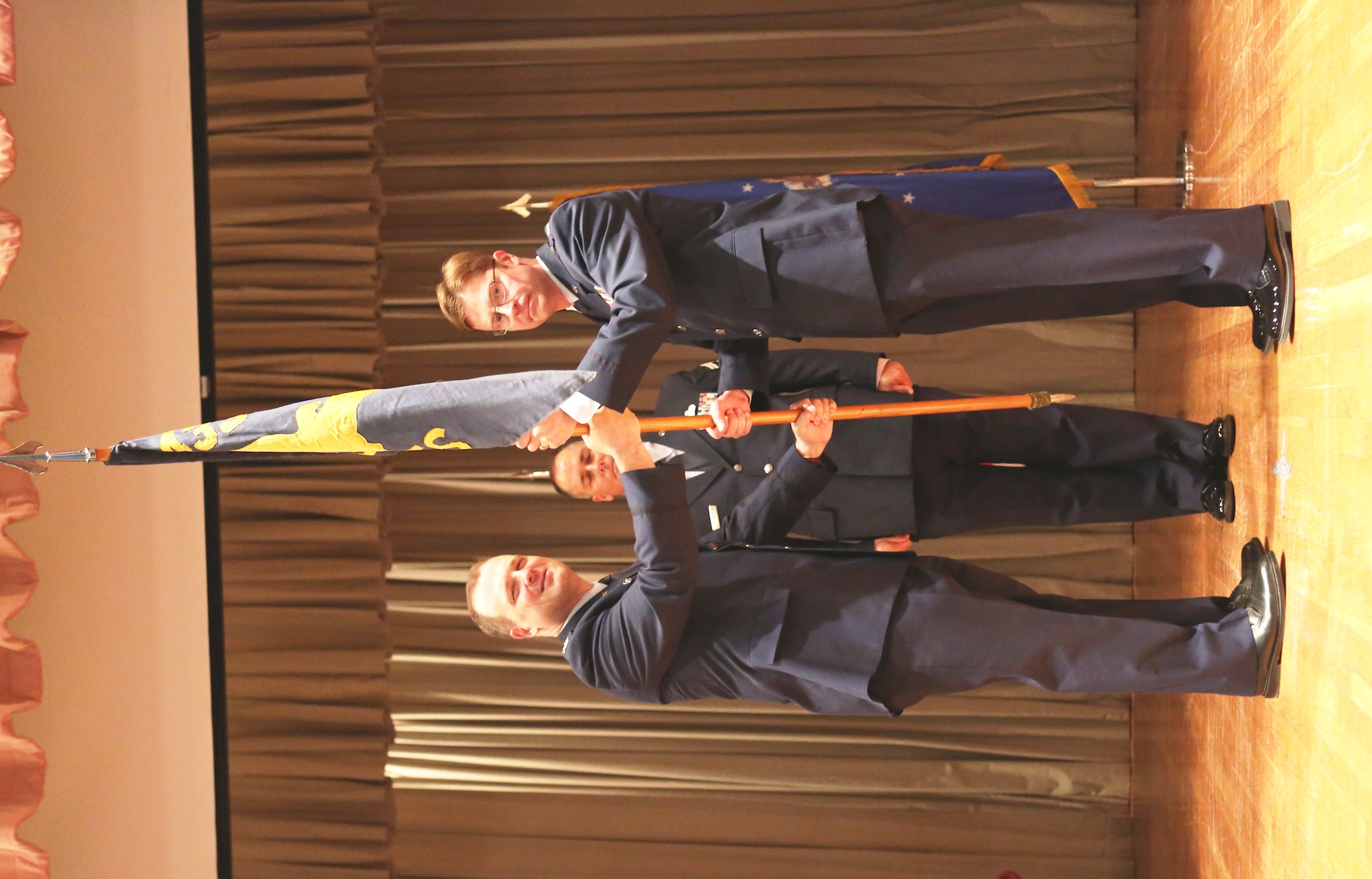 Col. Craig Petersen, commander, 433rd Mission Support Squadron presents the 433rd Civil Engineering flag to new 433rd CE Commander, Lt. Col. Stephen Koenig, signifying the transfer of command at Joint Base San Antonio-Lackland, Texas, Aug. 5, 2012. Koenig is the successor to Lt. Col. Eric Bowden, who retired from the U.S. Air Force Reserve the same day of the change of command ceremony. (U.S. Air Force photo/ Staff Sgt. Deyanira Apolinar)
