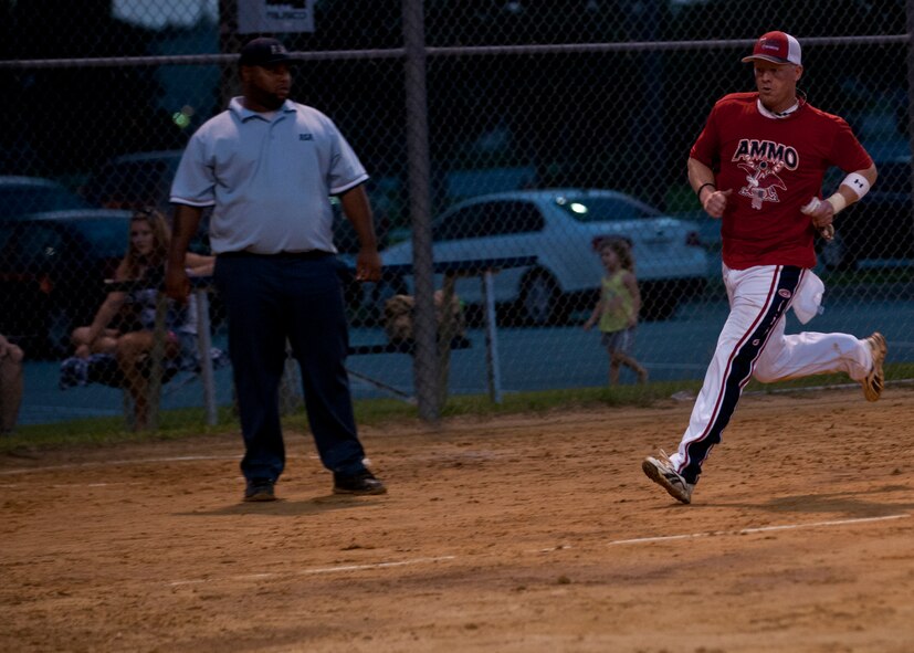 James Jerrell, 23d Equipment Maintenance Squadron noncommissioned officer in charge of munitions inspection, nears a homerun during the 2012 Moody Intramural Softball Championship game Aug. 8, 2012, at Moody Air Force Base, Ga. Jerrell played for team EMS that competed against team 723 AMXS, who took first place in the game with a score of 15-13. (U.S. Air Force photo by Senior Airman Eileen Meier/Released)