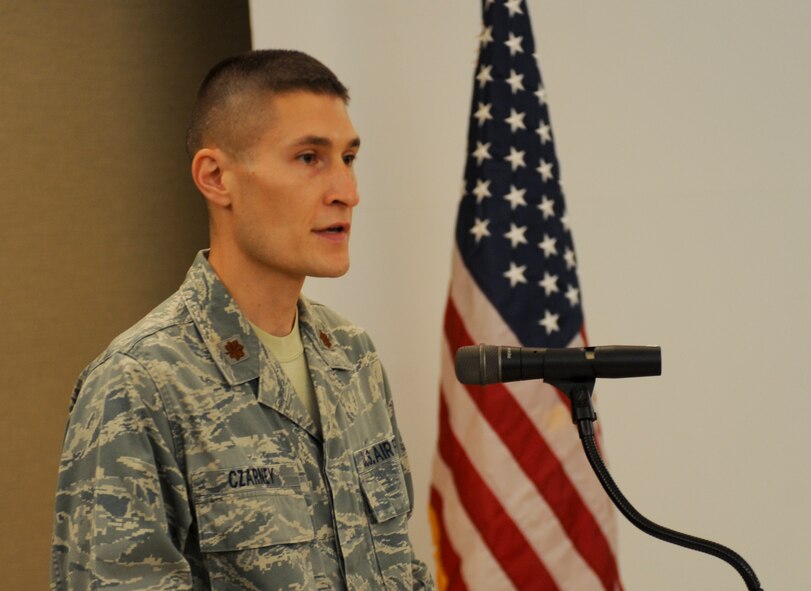 U.S. Air Force Maj. Jonathan Czarney, incoming 23d Contracting Squadron commander, gives a speech during an assumption of command ceremony at Moody Air Force Base, Ga., Aug. 9, 2012. Czarney expressed his excitement to have the opportunity to lead the squadron. (U.S. Air Force photo by Airman 1st Class Douglas Ellis/Released)

