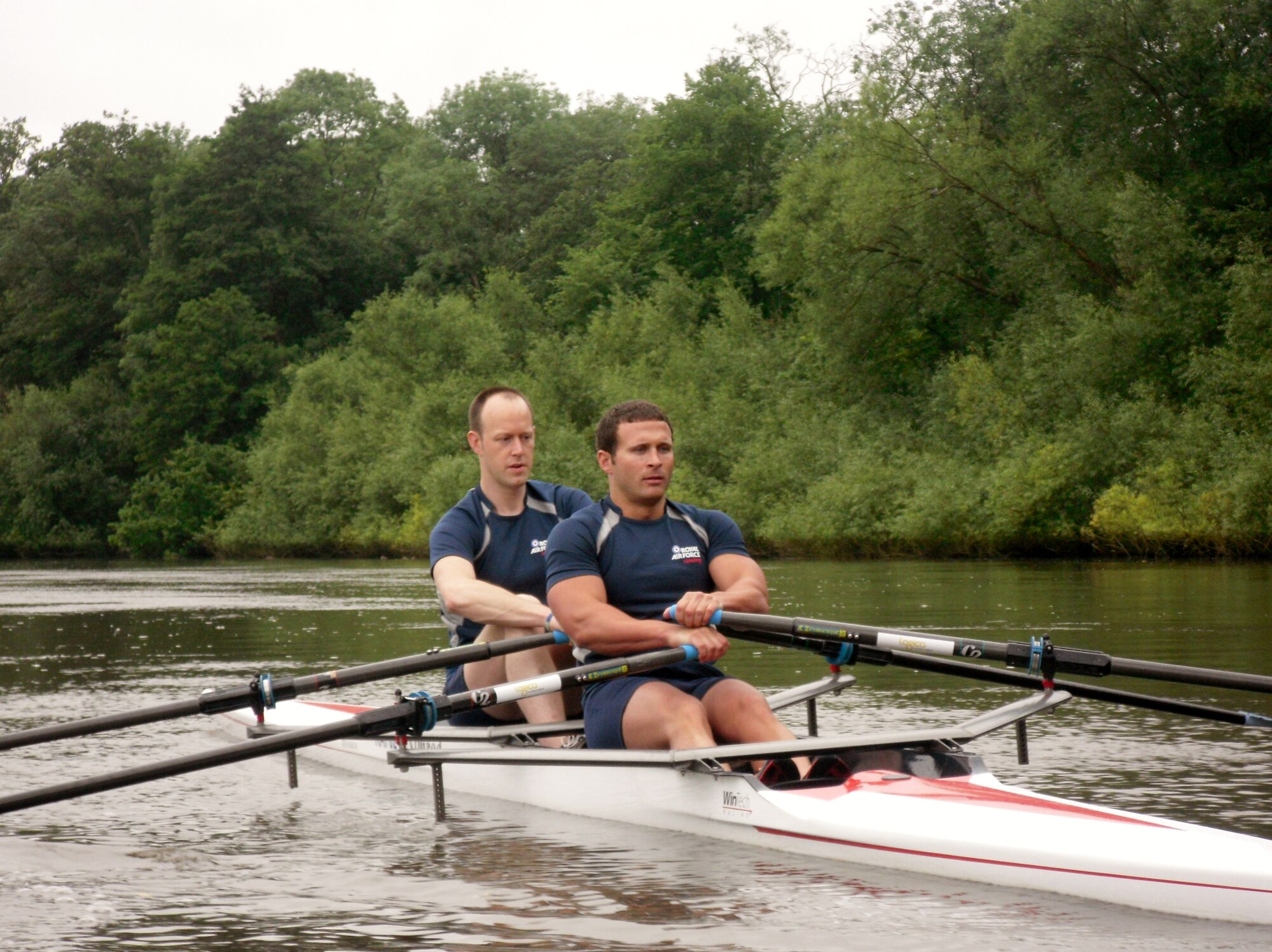 Staff Sgt. Jarrod White, 90th Maintenance Operations Squadron missile maintenance instructor, joins a member of the Royal Air Force's rowing team on the River Thames during his trip to London he earned by winning the Air Force Global Strike American300 Rowing Challenge. To win the challenge, White rowed a total of 981 miles on an indoor rowing machine that was later presented to the RAF as part of the Challenge during the trip. While rowing with members of the RAF, White participated in a form of rowing known as "skulling," where participants compete in teams of two, using two paddles. (courtesy photo)