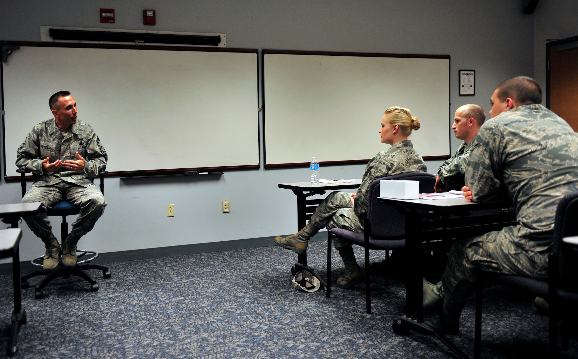 Chief Master Sgt. Todd Petzel, 375th Logistics Readiness Squadron superintendent, speaks to first term Airmen about how to be an effective leader and follower during the First Four Airmen Leadership Conference (FALCON) Aug 8, 2012, held on Scott Air Force Base, Ill. The conference, the first of its kind on Scott, was designed for first-term Airmen by first-term Airmen to help them learn networking, professional development and self-improvement skills. (U.S. Air Force photo/ Staff Sgt. Stephenie Wade) 