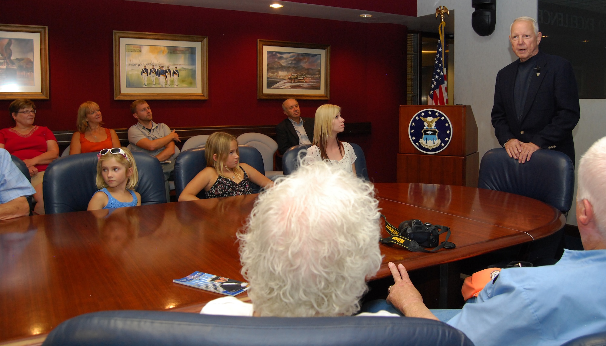 Retired Maj. Gen. Harold Todd talks to members of the Mackay family during their visit to the Academy Aug. 3. The Mackays are related to 2nd Lt. Francis Lowry, after whom Lowry Air Force Base, Colo., was named. Todd, from the Academy’s Class of 1959, was the first Academy graduate to pin on general officer rank.  (U.S. Air Force Photo/Don Branum)