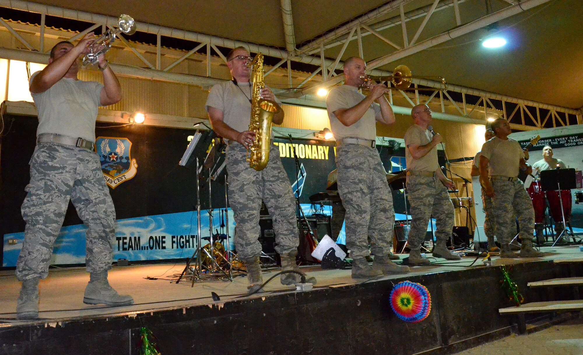 SOUTHWEST ASIA - U.S. Air Forces Central band Vector performs for the 380th Air Expeditionary Wing Aug. 8, 2012. The band visited the wing Aug. 7-10 and performed small sets in addition to a rock show and salsa show. (U.S. Air Force photo/Senior Airman Jared Elliott)