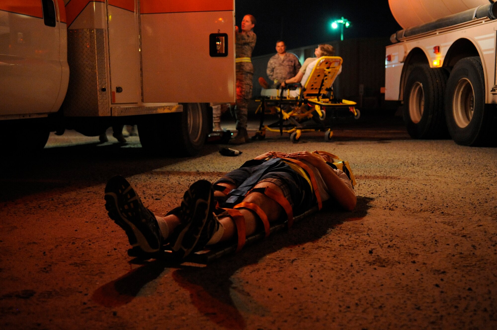 SOUTHWEST ASIA – The 386th Expeditionary Medical Support responded to the 386th Expeditionary Civil Engineer Squadron fire department exercise of a crashed vehicle into a building here August 7. The first responders treated five simulated patients for simulated burns and vehicle-crash related injuries. (U.S. Air Force photo/Staff Sgt. Alexandra M. Boutte)