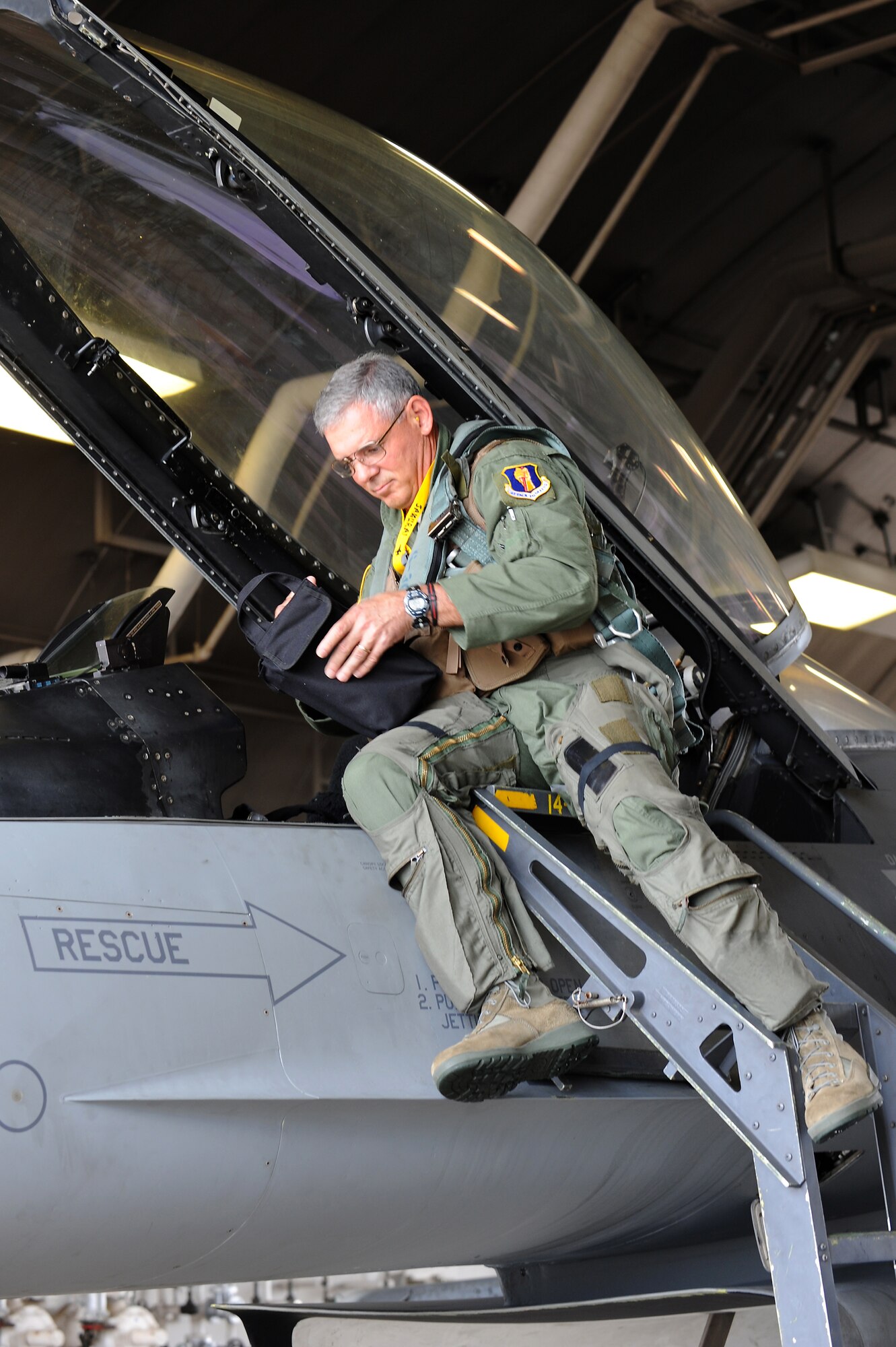 U.S. Air Force Lt. Gen. Sam Angelella, U.S. Forces, Japan, and 5th Air Force commander, boards an F-16 Fighting Falcon before a flight at Misawa Air Base, Japan, Aug. 10, 2012. During the visit to Misawa, Angelella met with the city mayor and Japan Air Self-Defense Force leadership to thank them for their continued support to U.S. servicemembers in the region.  (U.S. Air Force photo by Airman 1st Class Kia Atkins/Released) 