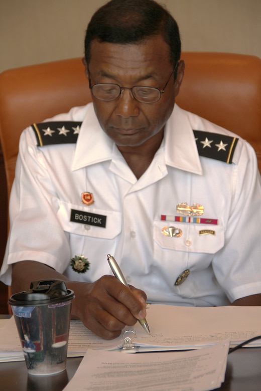 LITTLE ROCK, Arkansas — Lt. Gen. Thomas P. Bostick, U.S. Army Corps of Engineers commanding general, takes notes as media questions are answered after announcing the Army's $7B Multiple Award Task Order Contract, Request for Proposal, Aug. 7, 2012.