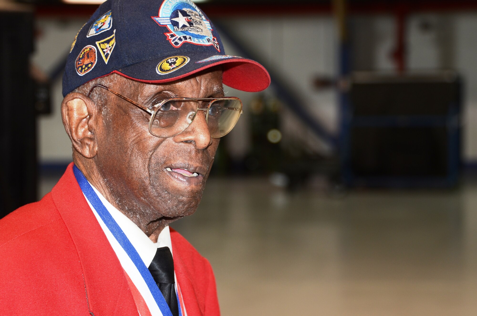 Tuskegee Airman Dr. Cyril O. Byron, Sr. looks at an A-10C of the 175th Wing of the Maryland Air National Guard Saturday, August 11th. Byron toured the base after helping with a promotion ceremony for Senior Master Sgt. Ed Bard. (National Guard photo Tech. Sgt. Chris Schepers)