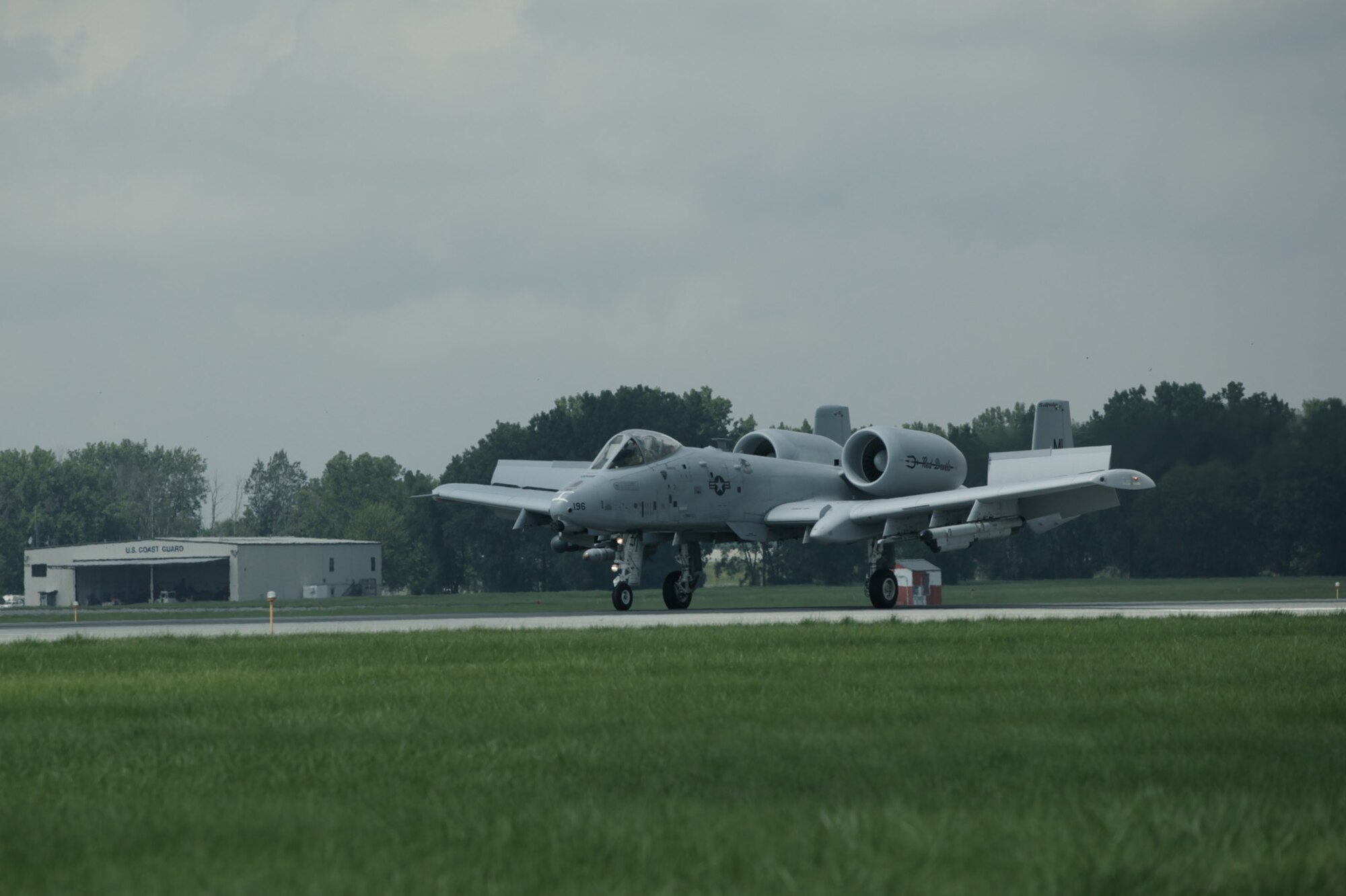 A Michigan Air National Guard A-10 Thunderbolt II taxies in after landing at Selfridge Air National Guard Base, Mich., Aug. 10, 2012. The joint nature of Selfridge is visible in this photo – the hangar in the background is used by Coast Guard Air Station Detroit, which operates a search and rescue helicopter squadron at Selfridge. (Air National Guard photo by TSgt. Robert Hanet)