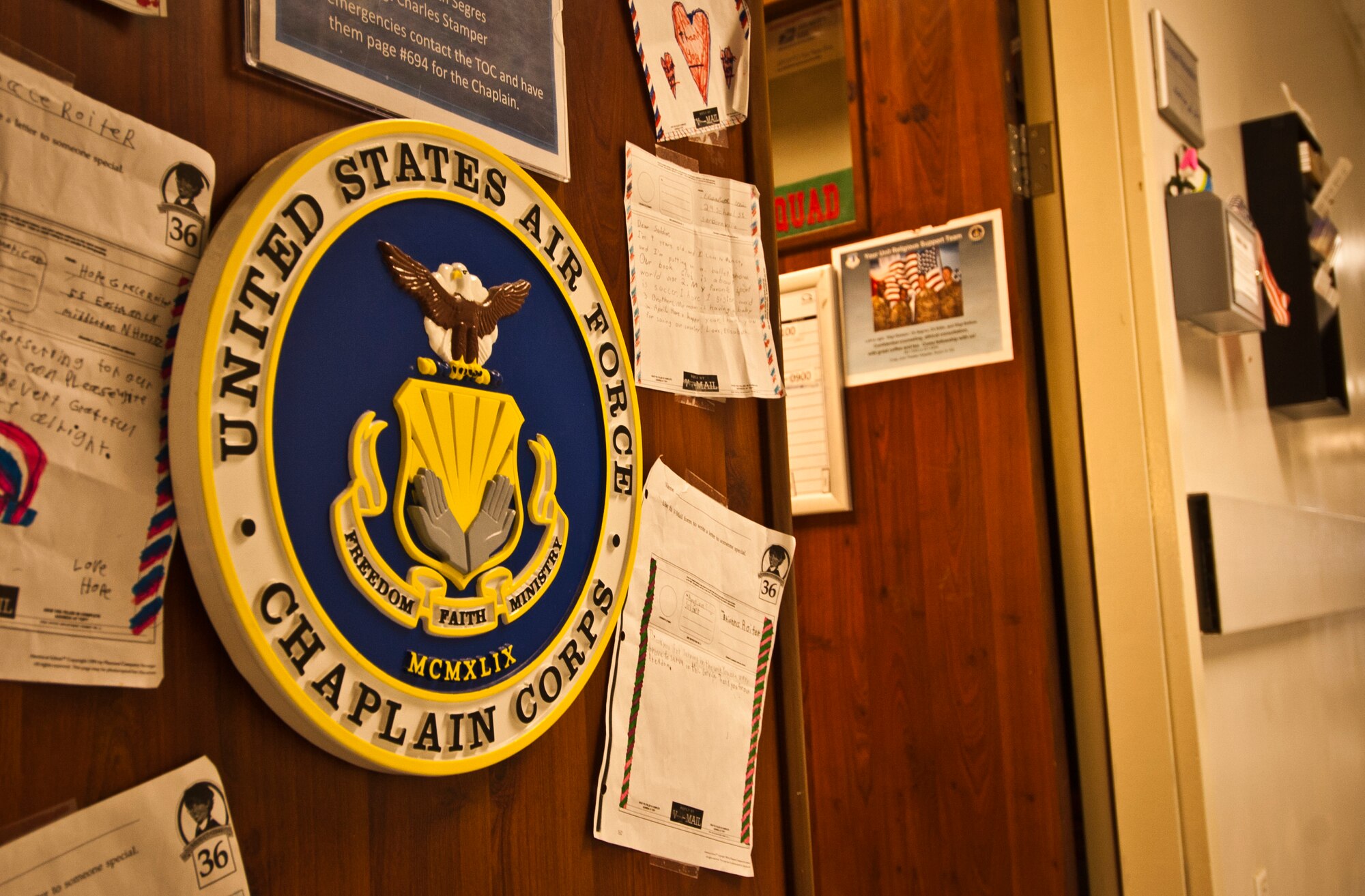 The Craig Joint Theater Hospital Chaplain's office door stands open to welcome visitors seeking spiritual support at Bagram Airfield, Afghanistan, Aug. 4, 2012. Bagram’s Religious Support Teams offer spiritual support to Airmen managing the stress of deployed operations. (U.S. Air Force Photo/Capt. Raymond Geoffroy)