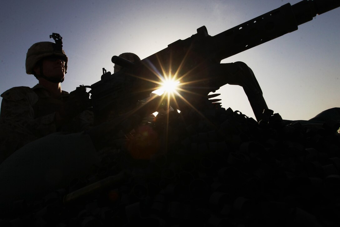 Cpl. Joshua Brooks, a machine gunner from Petoskey, Mich., with Charlie Company, Battalion Landing Team 1st Battalion, 2nd Marine Regiment, 24th Marine Expeditionary Unit, fires an M-2 .50 cal. machine gun, Aug. 12, 2012, on Udairi Range, Kuwait. The Marines are in Kuwait as part of a 24th MEU sustainment training package. The 24th MEU is deployed with the Iwo Jima Amphibious Ready Group as a U.S. Central Command theater reserve force providing support for maritime security operations and theater security cooperation efforts in the U.S. 5th Fleet area of responsibility.