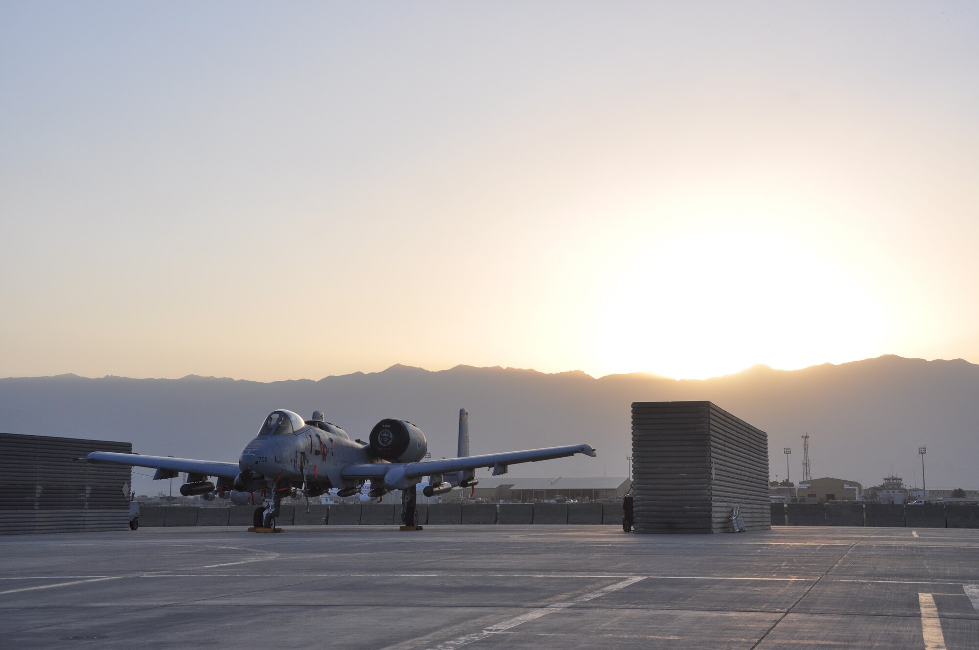 A-10 pilots "Zucco" and "Metro" reminisce at Bagram Airfield, Afghanistan, July 7, 2012, whille standing near one of the aircraft they flew during a harrowing mission in support of ambushed Coalition forces fighting during dangerous weather conditions. The pilots, along with a dozen other pilots from their home unit, the 104th Fighter Squadron with the Maryland Air National Guard, protected about 90 coalition servicemembers during a major battle in the mountains of eastern Afghanistan. (U.S. Air Force photo/TSgt Shawn McCowan)
