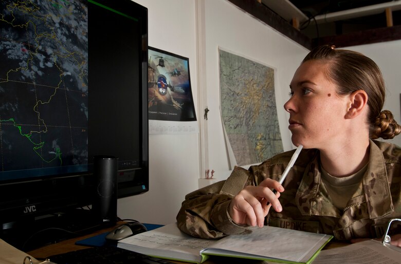 SSgt Olivia Updike, Weather Forecaster with the 455th Expeditionary Operations Support Squadron, reviews weather data at Bagram Airfield, Afghanistan, July 14, 2012. Updike provided accurate weather data which enabled Bagram A-10 Thunderbolt II pilots to successful provide life-saving close air support to ambushed coalition forces in eastern Afghanistan on June 28, 2012. (U.S. Air Force photo/Capt. Raymond Geoffroy)