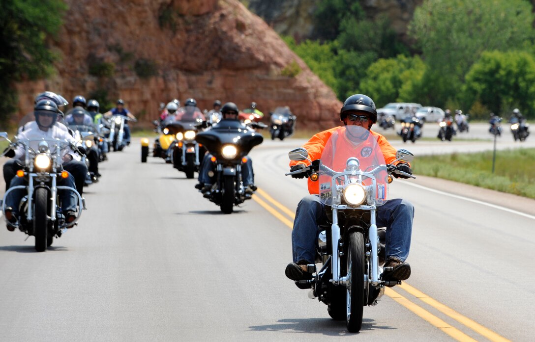 Rory Adams, an on-site operational support consultant for Ellsworth and former aviator, leads the pack during the 2012 Dakota Thunder Run Aug. 7, 2012. Cyclists were encouraged to ride in a staggered formation to ensure a safe and enjoyable trip through the Black Hills while participating in the 12th annual ride. (U.S. Air Force photo by Airman Ashley J. Cass/Released) 