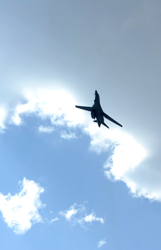 A B-1 bomber flies over Main Street during Military Appreciation Day in downtown Sturgis, S.D., Aug. 7, 2012. The day was dedicated to retired Lt. Col. Donald Smith, who was presented with an American flag that was flown over Afghanistan on the 10th anniversary of 9/11 at the conclusion of the Dakota Thunder Run. (U.S. Air Force photo by Airman Ashley J. Cass/Released)