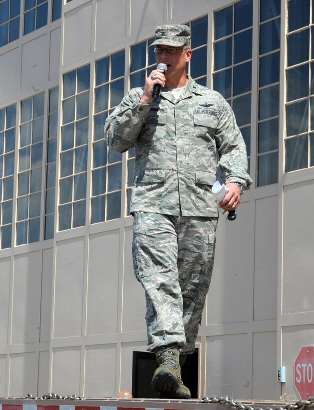 Col. Mark Weatherington, 28th Bomb Wing commander, addresses 2012 Dakota Thunder Motorcycle Run participants on the flightline at Ellsworth Air Force Base, S.D., Aug. 7, 2012. The run is intended to honor military members and veterans, and culminates with a military appreciation event each year where a local veteran is recognized for their service. (U.S. Air Force photo by Airman Ashley J. Cass/Released)