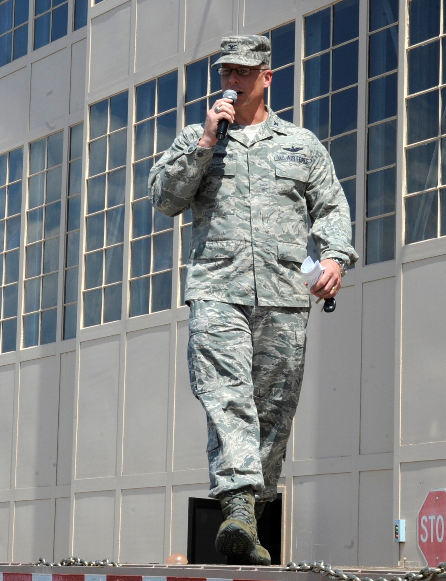 Col. Mark Weatherington, 28th Bomb Wing commander, addresses 2012 Dakota Thunder Motorcycle Run participants on the flightline at Ellsworth Air Force Base, S.D., Aug. 7, 2012. The run is intended to honor military members and veterans, and culminates with a military appreciation event each year where a local veteran is recognized for their service. (U.S. Air Force photo by Airman Ashley J. Cass/Released)