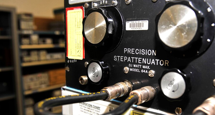 The Precision Stepattenuator calibrates electrical equipment in the Precision Measurement Equipment Laboratory at Cannon Air Force Base, N.M., Aug. 8, 2012. The PMEL is the shop compromised of civilian contractors who calibrate base equipment that is used to test, measure or diagnose other systems. (U.S. Air Force photo/Airman 1st Class Ericka Engblom)