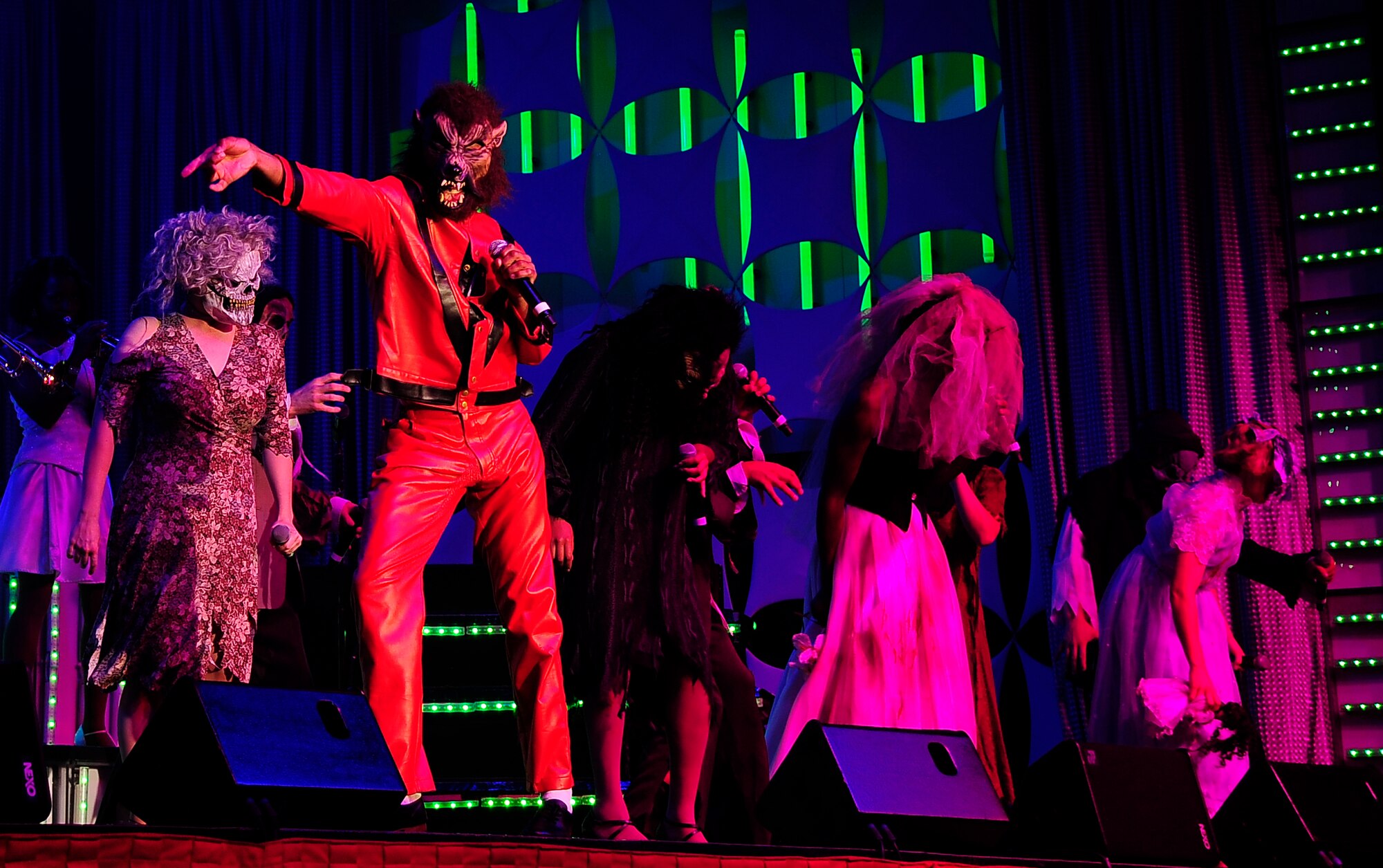 Tops In Blue perform a rendition of Michael Jackson's "Thriller" at the University of Central Missouri in Warrensburg, Mo., Aug. 9, 2012. The two hour concert was targeted for Whiteman Air Force Base service members and their families, but fans from the local communities were welcome also. Tops In Blue travel throughout the United States and to more than 20 countries during their 10-month tour each year. (U.S. Air Force photo/Senior Airman Cody H. Ramirez)