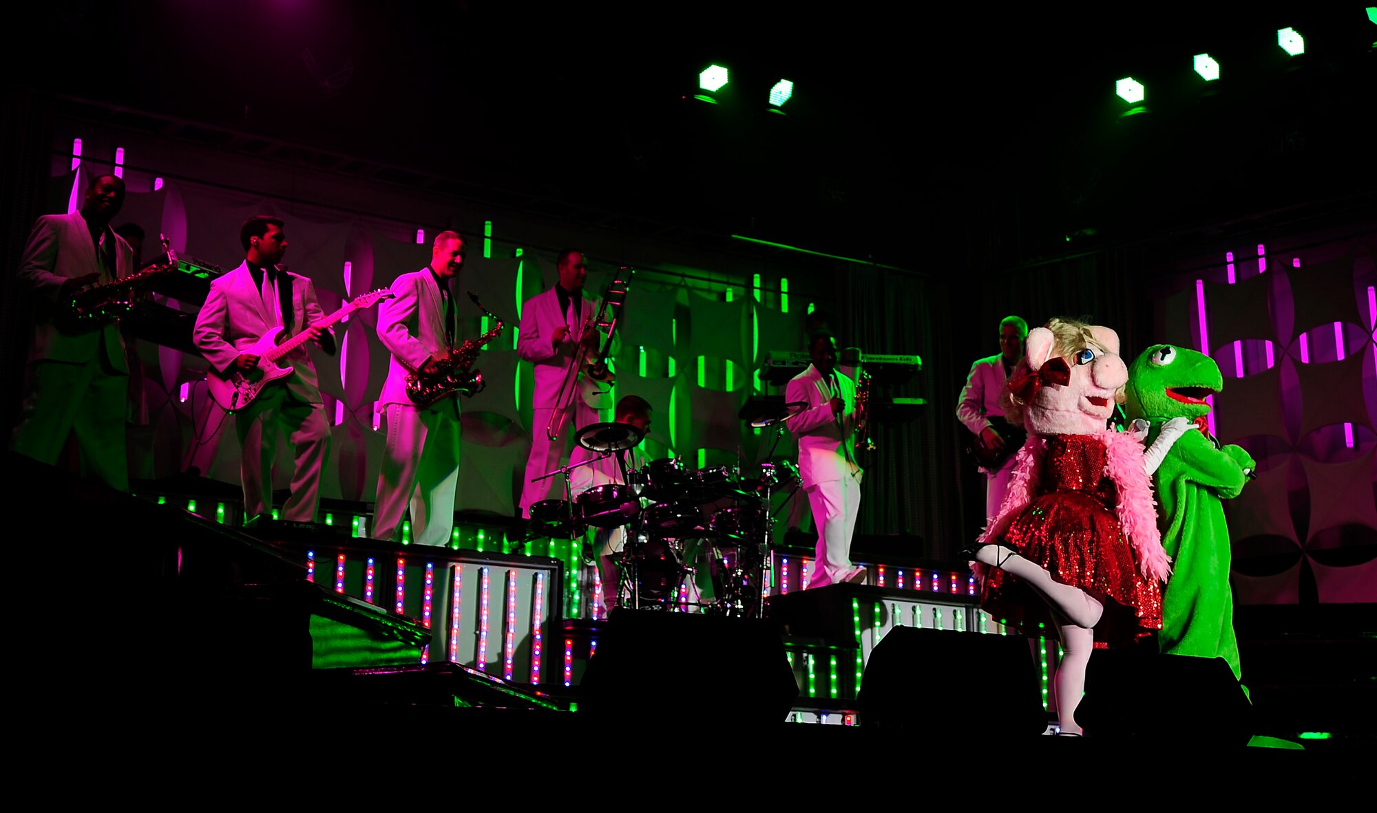 Kermit and Miss Piggy surprise the audience during a Tops In Blue performance at the University of Central Missouri in Warrensburg, Mo., Aug. 9, 2012. The two hour concert was targeted for Whiteman Air Force Base service members and their families, but fans from the local communities were welcome also. Tops In Blue travel throughout the United States and to more than 20 countries during their 10-month tour each year. (U.S. Air Force photo/Senior Airman Cody H. Ramirez)
