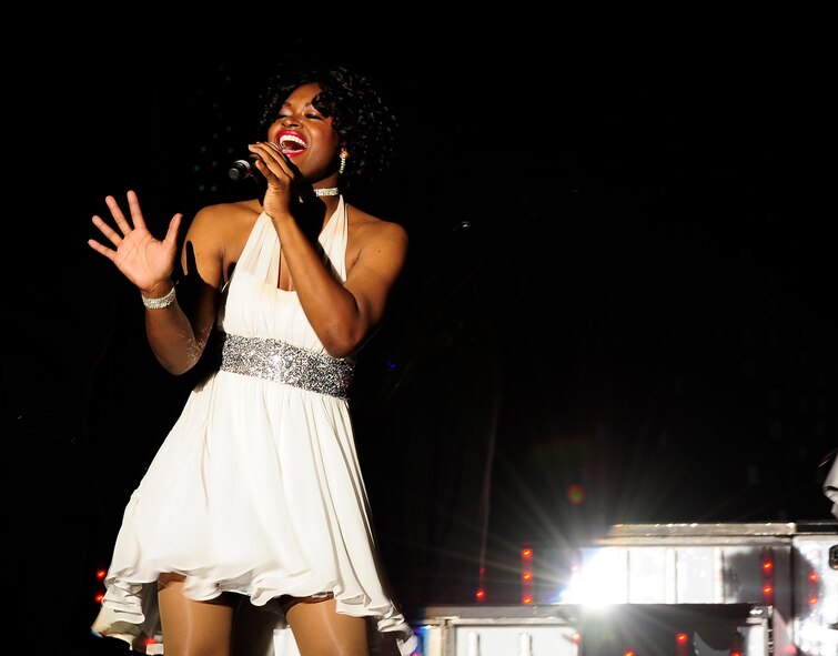 Tech. Sgt. Tonie Marshal sings "Night Life" during a Tops In Blue performance at the University of Central Missouri in Warrensburg, Mo., Aug. 9, 2012. The two hour concert was targeted for Whiteman Air Force Base service members and their families, but fans from the local communities were welcome also. (U.S. Air Force photo/Senior Airman Cody H. Ramirez)