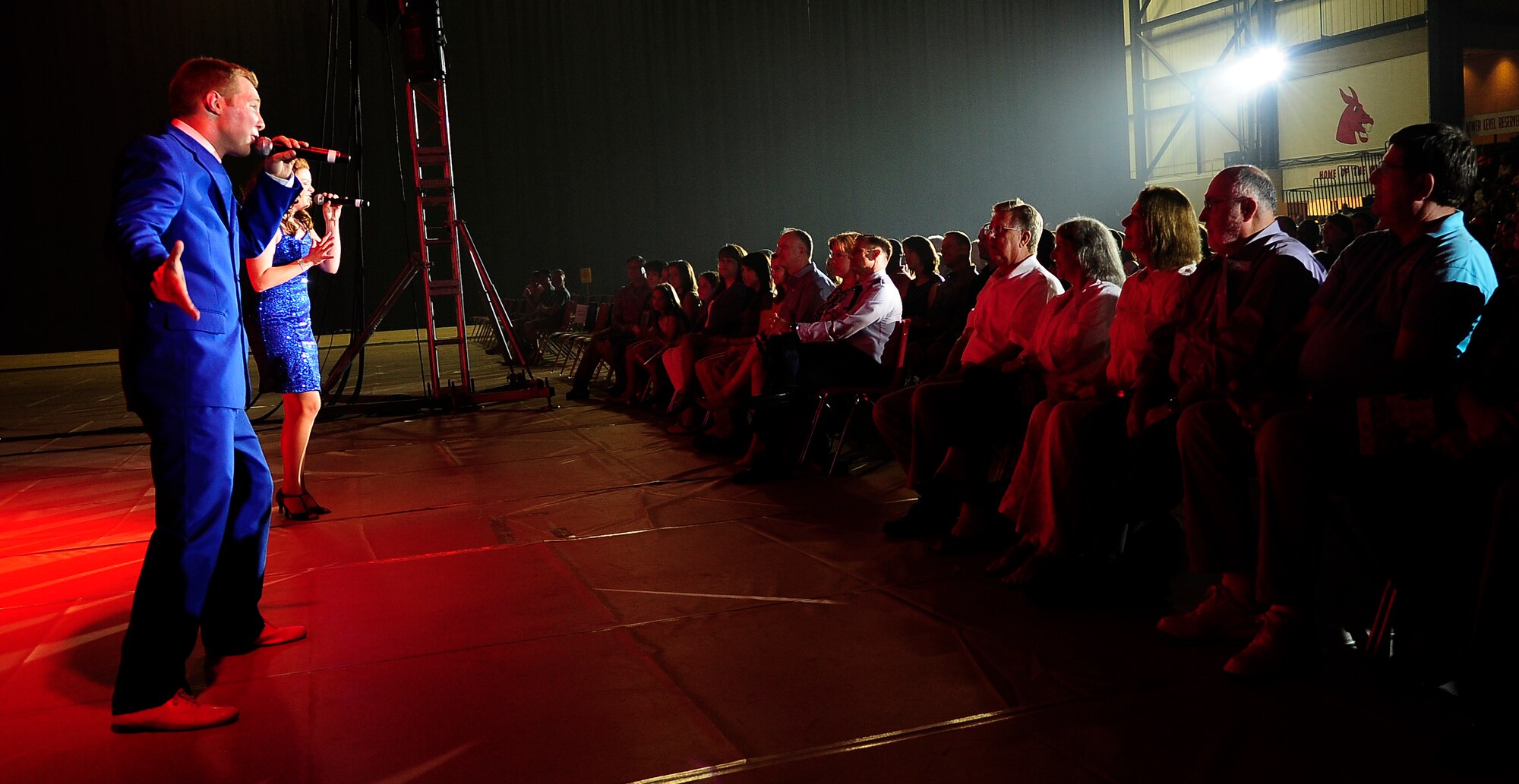 Hundreds of fans from Whiteman Air Force Base and the local area watch Tops In Blue perform at the University of Central Missouri in Warrensburg, Mo., Aug. 9, 2012. Tops In Blue travel throughout the United States and to more than 20 countries during their 10-month tour each year. (U.S. Air Force photo/Senior Airman Cody H. Ramirez)