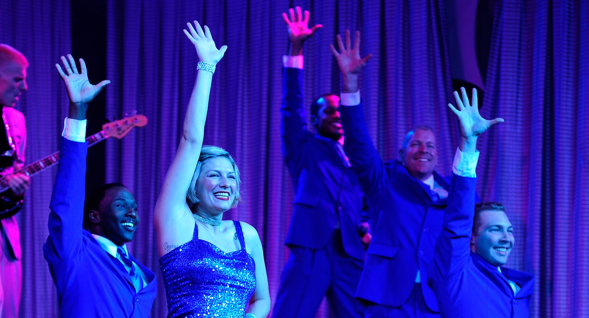 Tops In Blue, the premier Air Force entertainment ensemble, performs in Warrensburg, Mo at the University of Central Missouri Aug. 9, 2012. The musical performance covered songs from a wide variety of genres.  (U.S. Air Force photo/Senior Airman Cody H. Ramirez)