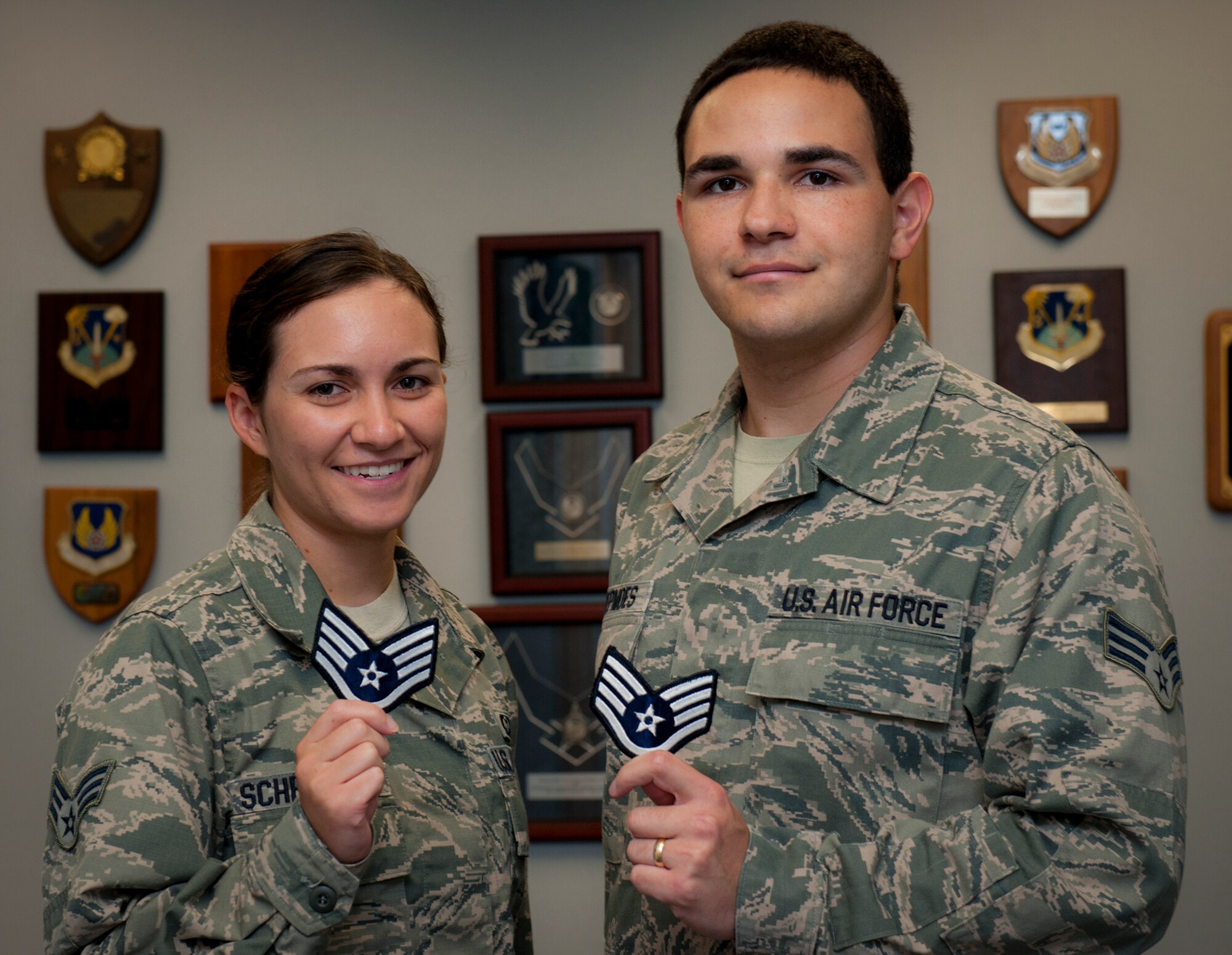 Senior Airmen Richard and Airel Schepmoes, a married couple in the 96th Test Wing, were both selected for promotion to staff sergeant this year. The couple is in the same career field and work in the same unit, the 96th Weather Flight. The Schepmoes are expected to sew on their new stripes by the end of 2012. (U.S. Air Force photo/Samuel King Jr.)
