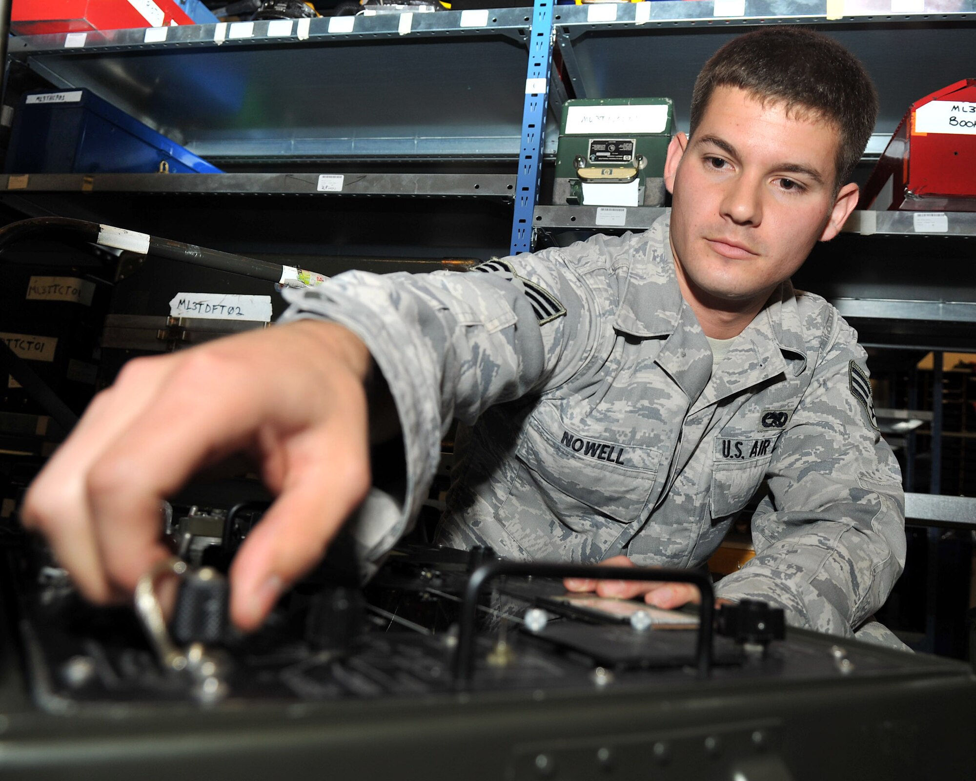 RAF MILDENHALL, England - Senior Airman Christopher M. Nowell, 100th Aircraft Maintenance Squadron, performs operations checks on equipment Aug. 2, 2012, in bldg. 809. (U.S. Air Force photo/Senior Airman Jerilyn Quintanilla)