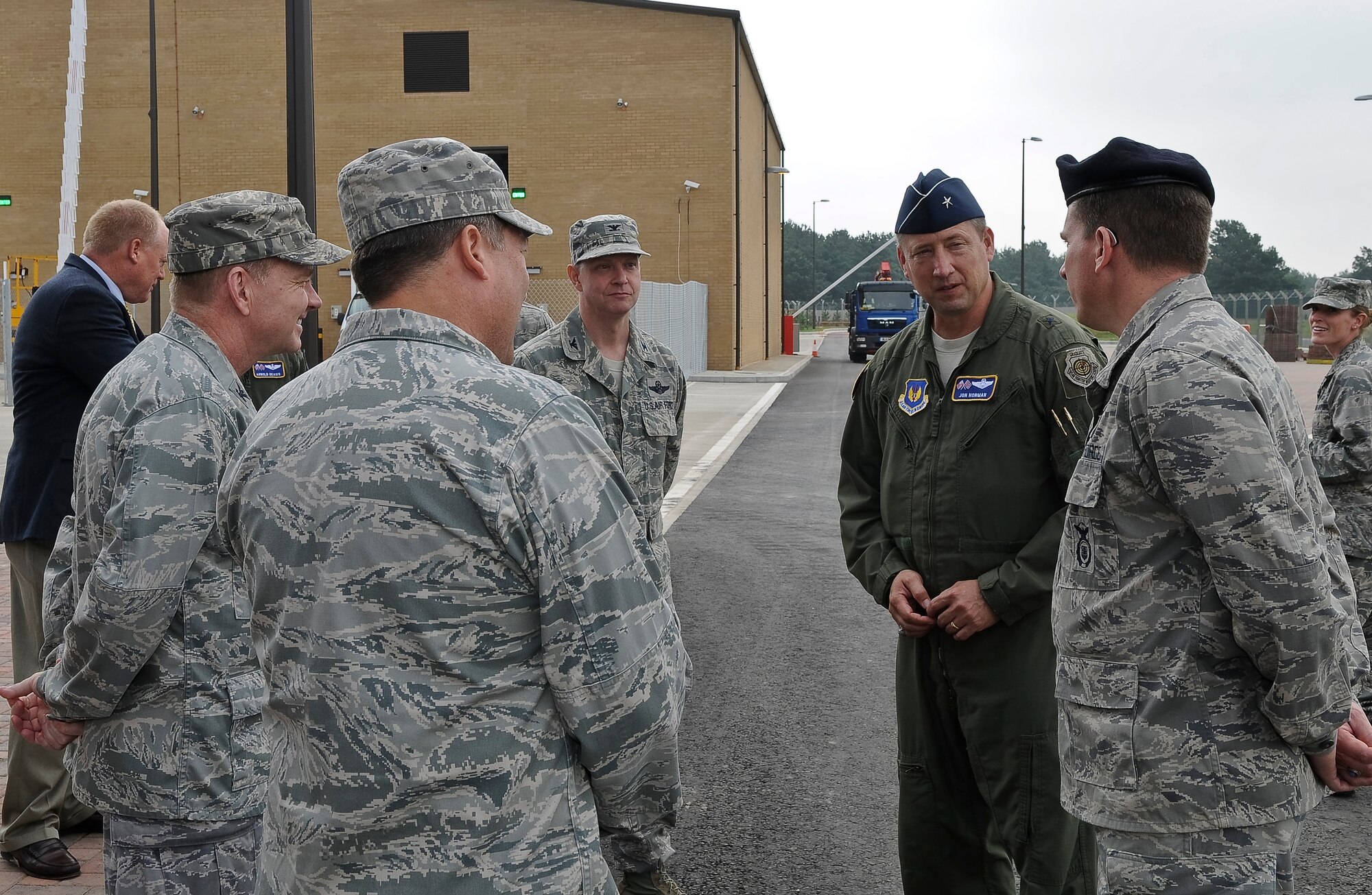 ROYAL AIR FORCE LAKENHEATH, England -- Brig. Gen. Jon Norman, Director, United States Air Forces in Europe-United Kingdom, gets a construction report of the Large Vehicle Inspection Station from Lt. Col. Paul Cairney (right), 48th Security Forces commander, during his visit of the 48th Fighter Wing Aug. 9, 2012. Norman toured the 48th Maintenance Group, 48th Medical Group and various locations around RAF Lakenheath.  (U.S. Air Force photo by Senior Airman Connor Estes)