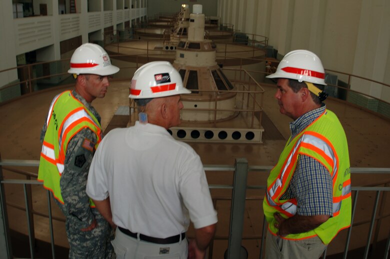 JAMESTOWN, Ky. — Larry Craig (center), U.S. Army Corps of Engineers Nashville District power project manager, leads Nashville Mayor Karl Dean (right) and Lt. Col. James A. DeLapp, Nashville District commander, on a tour of the Wolf Creek Dam Hydropower Plant Aug. 7, 201