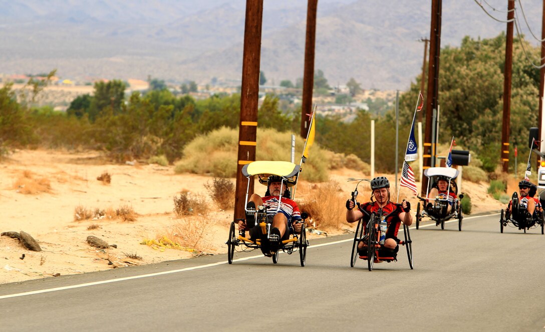 The Ride for Heroes team travels down Adobe Road toward the Combat Center during their cross country trip July 31, 2012. The team has been riding for nearly two months and has raised approximately $68,000 for the Super Fi Fund.